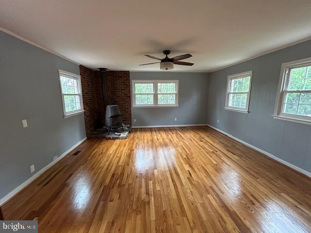 9923 Grayson Avenue Silver Spring, MD 20901 - Photo 11 of 24 a view of empty room with wooden floor and fan