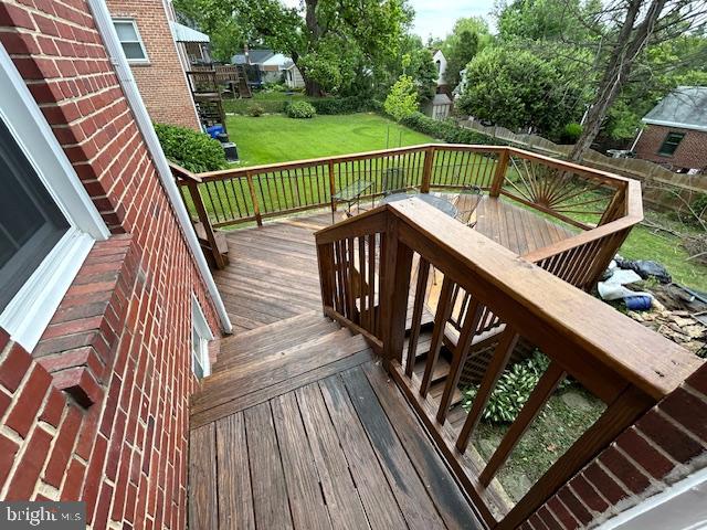 9923 Grayson Avenue Silver Spring, MD 20901 - Photo 17 of 24 a balcony with wooden floor in outdoor space