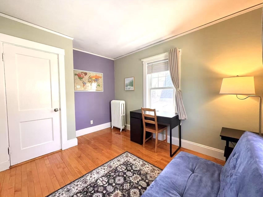 11 Sessions Street Wellesley, MA 02482 - Photo 13 of 22 a bedroom with furniture and a window