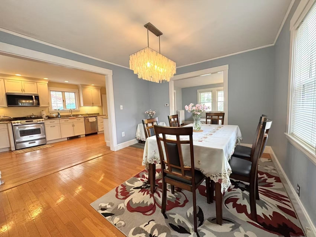 11 Sessions Street Wellesley, MA 02482 - Photo 6 of 22 a view of a dining room with furniture window and wooden floor