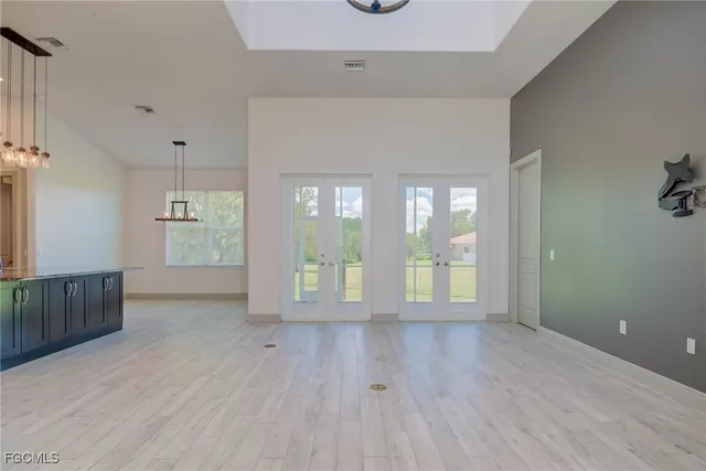 a living room with a bed and furniture