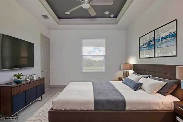 a bathroom with a granite countertop sink and a bathtub
