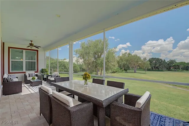 a view of an empty room with windows