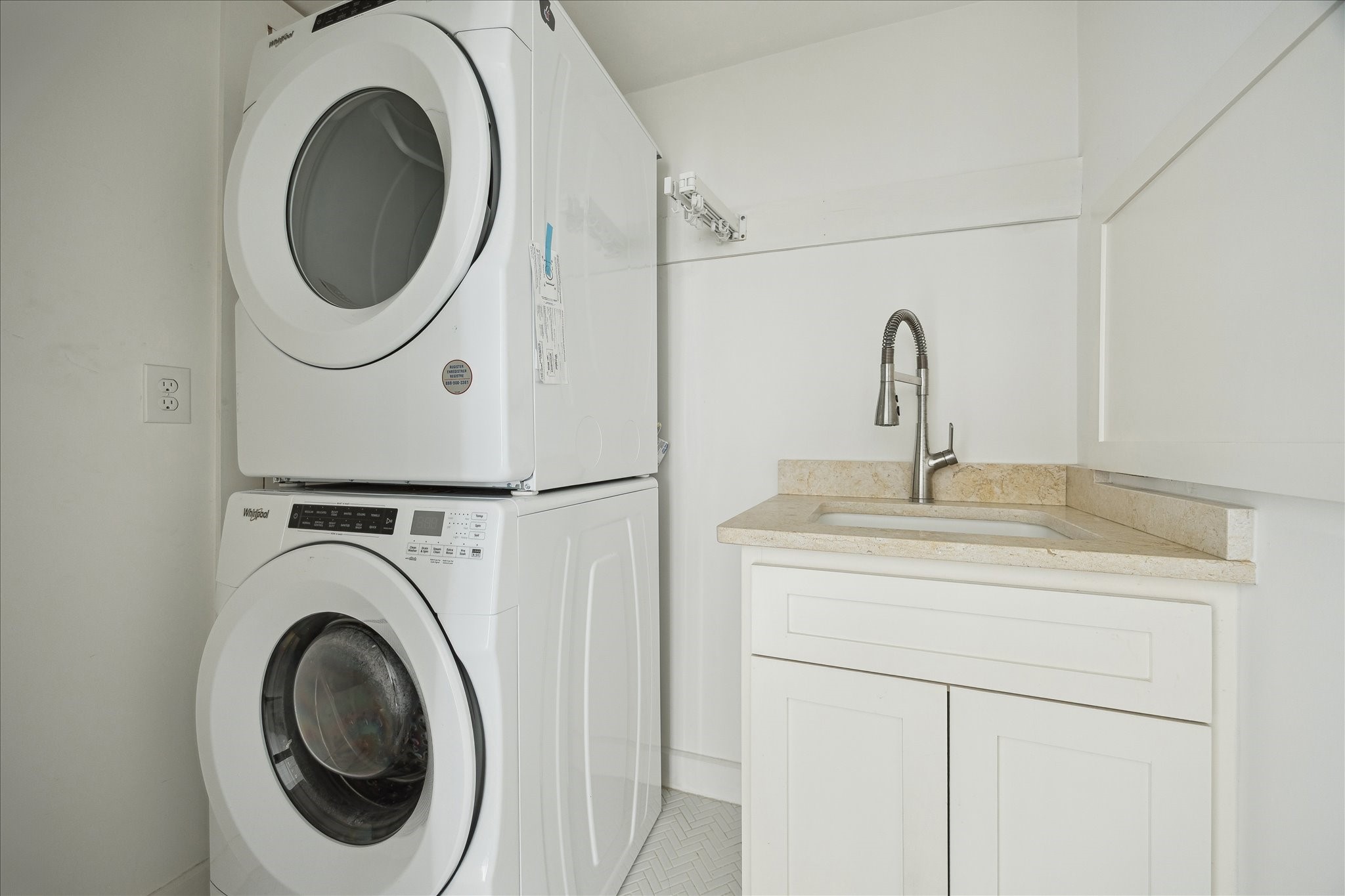 3049 Locke Lane Houston, TX 77019 - Photo 22 of 30 Utility room located inside the home at the landing of the stairs.