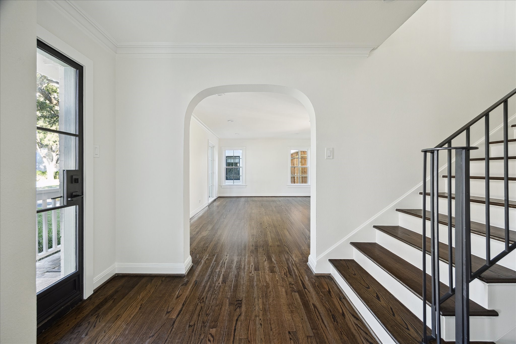 3049 Locke Lane Houston, TX 77019 - Photo 3 of 30 Upon entry, notice the light & bright tone found within this home as gleaming hardwoods lead one inside. The home holds a formal living room with beautiful hardwood floors.
