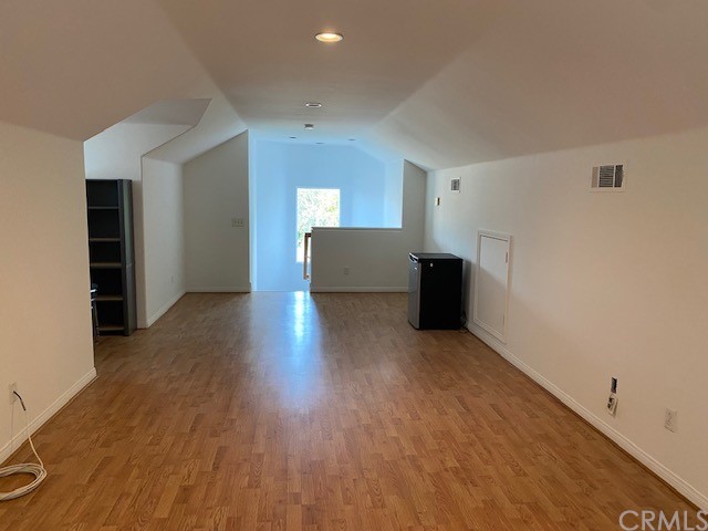 65 Ashford Irvine, CA 92618 - Photo 29 of 45 wooden floor in an empty room with a window