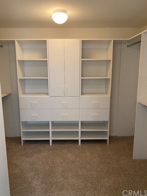 65 Ashford Irvine, CA 92618 - Photo 31 of 45 a view of walk in closet with empty racks