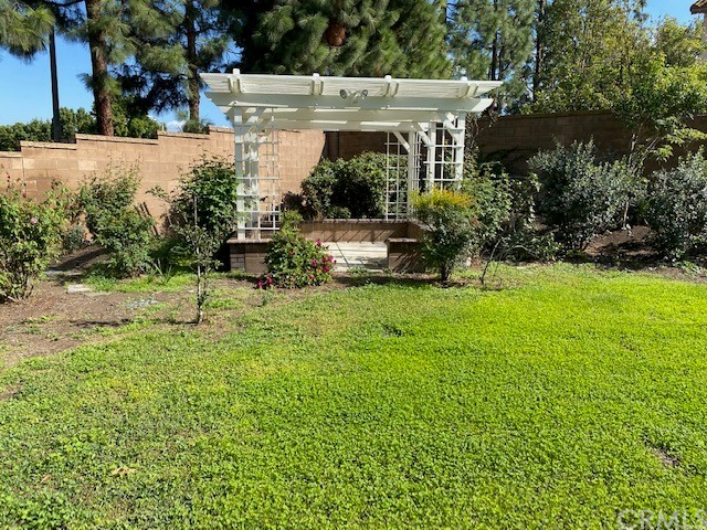 65 Ashford Irvine, CA 92618 - Photo 33 of 45 a view of backyard with swimming pool and patio