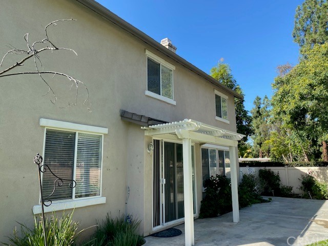 65 Ashford Irvine, CA 92618 - Photo 36 of 45 a front view of a house with a porch