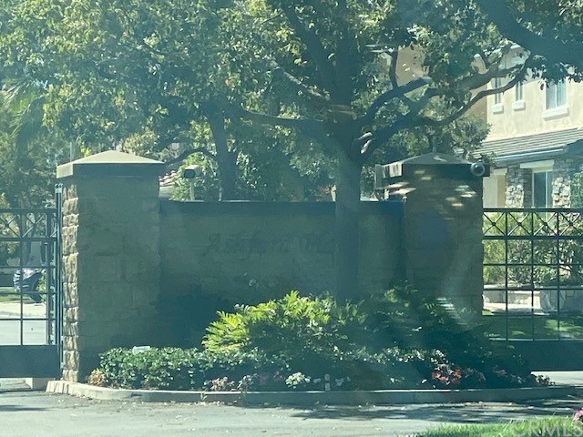 65 Ashford Irvine, CA 92618 - Photo 44 of 45 a front view of a house with a yard