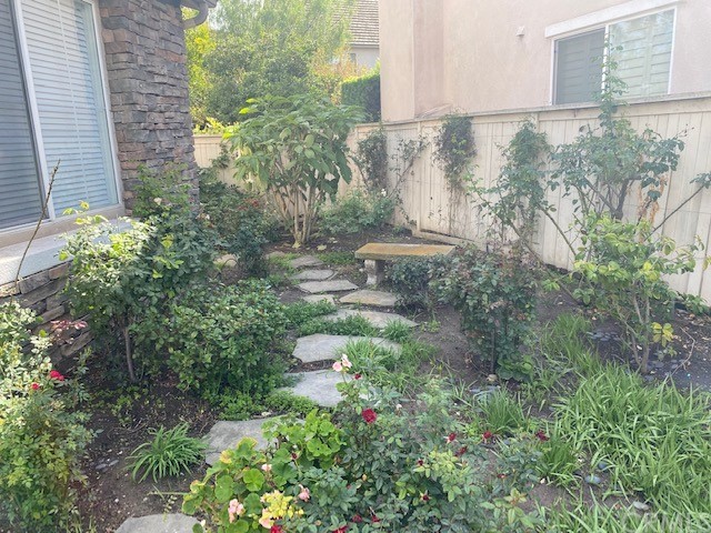 65 Ashford Irvine, CA 92618 - Photo 5 of 45 a view of a yard with plants and large trees