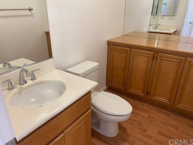 65 Ashford Irvine, CA 92618 - Photo 8 of 45 a bathroom with a sink toilet and vanity