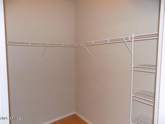 a view of a room with racks on the wall