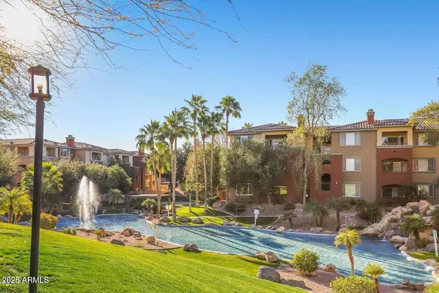 a view of a patio with swimming pool
