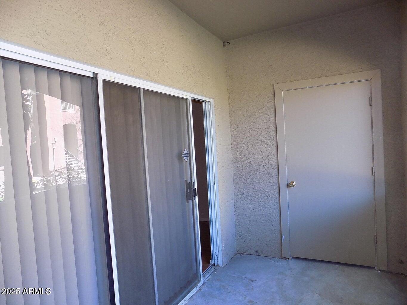 5401 East Van Buren Street, Unit 1027 Phoenix, AZ 85008 - Photo 23 of 23 a view of an empty room
