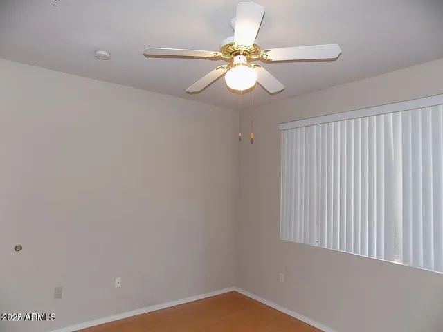 a view of a small space with a fan