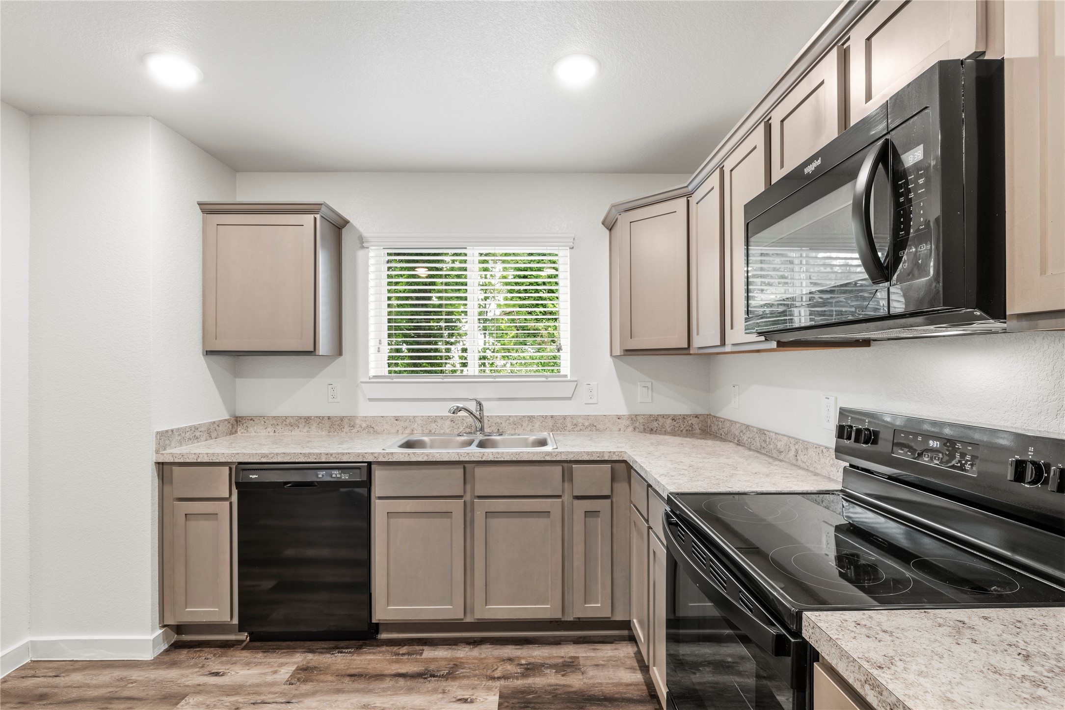 12603 Telge Road, Unit 1EH Cypress, TX 77429 - Photo 6 of 19 Window above the sink provides natural lighting.