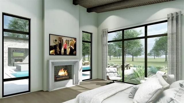 a bedroom with a bed and a fireplace