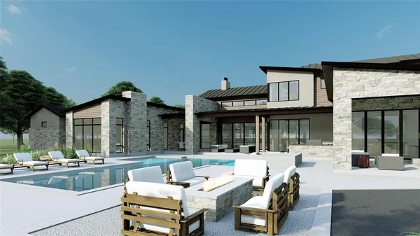 a view of a patio with couches table and chairs and potted plants