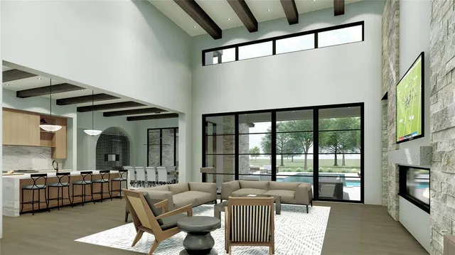 a living room with furniture large window and flat screen tv