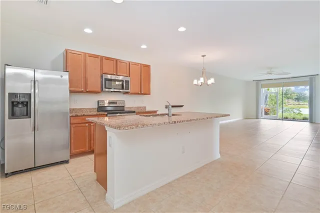 a kitchen with sink and window