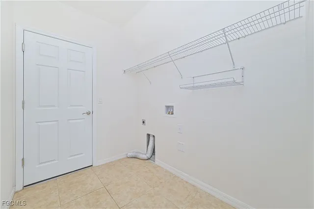 a view of an outdoor space and tennis court