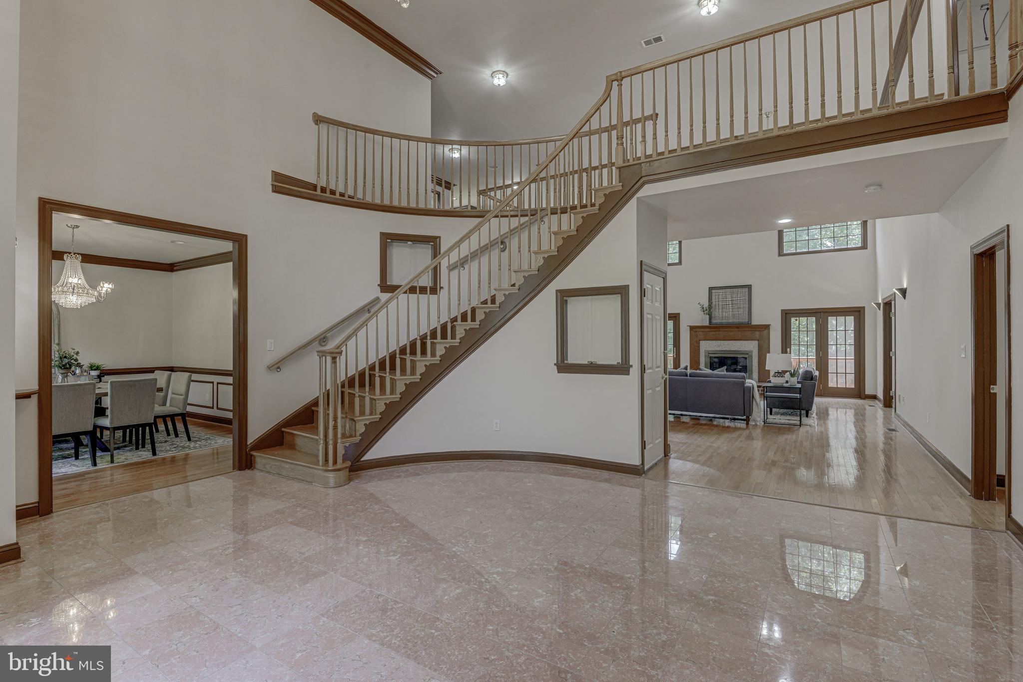 2172 Misty Meadow Road Finksburg, MD 21048 - Photo 20 of 118 Foyer, pink Italian marble, curved staircase.