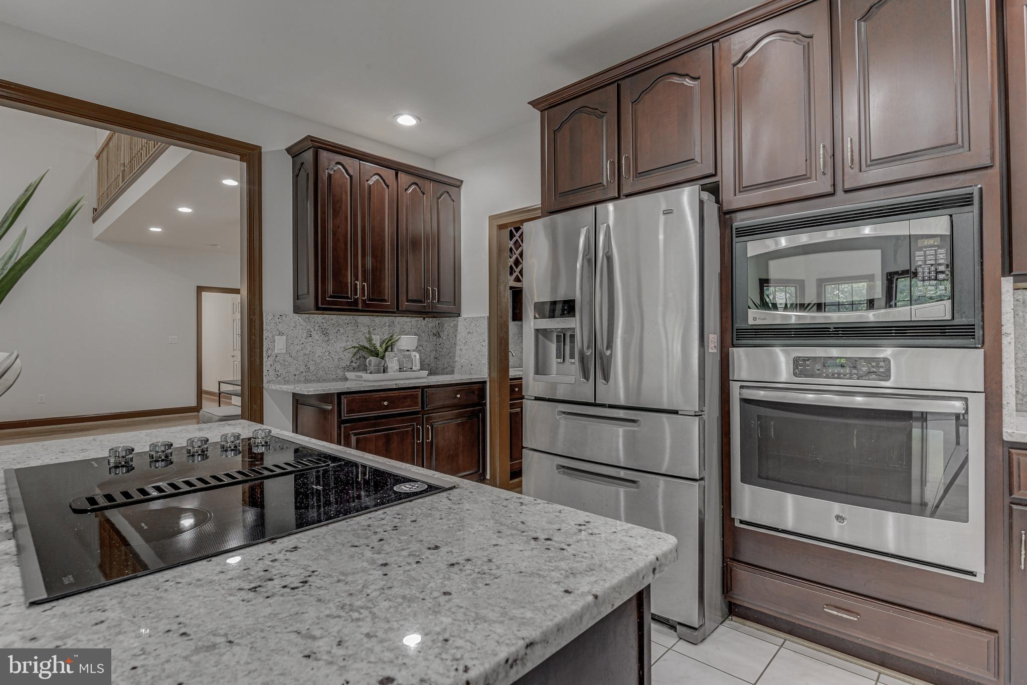 2172 Misty Meadow Road Finksburg, MD 21048 - Photo 41 of 118 Cooktop, wall-oven, custom cabinets.