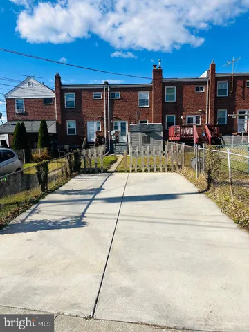 a view of a building with a patio