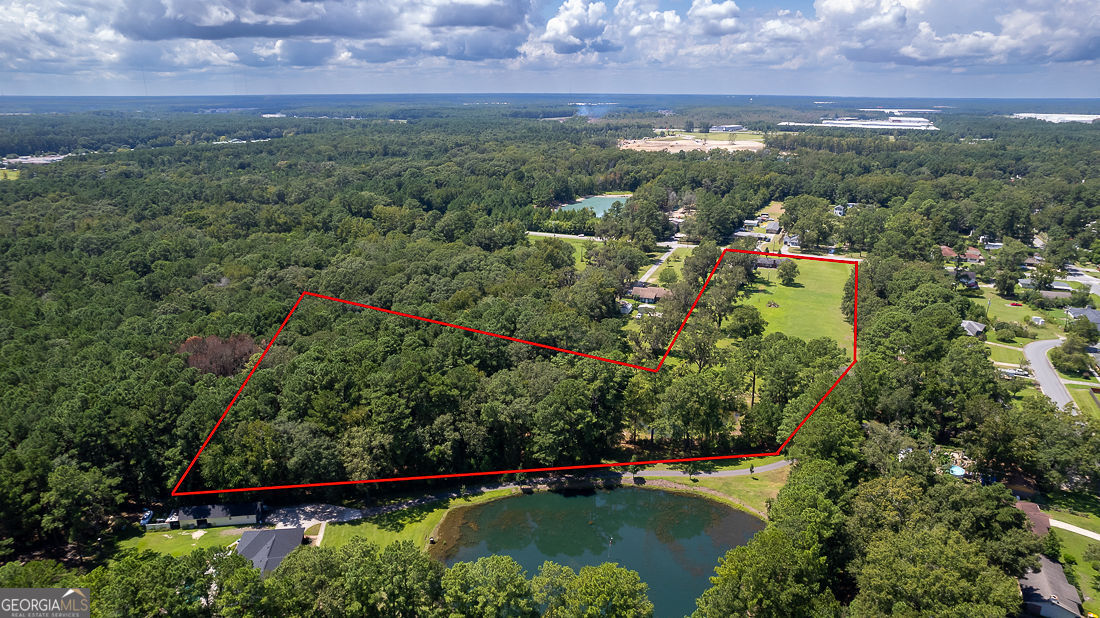 1324 South Rogers Street Pooler, GA 31322 - Photo 6 of 10 an aerial view of a houses with a yard
