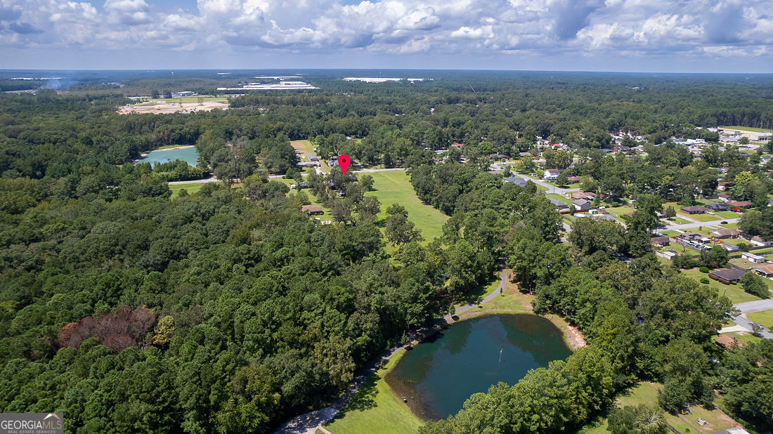 1324 South Rogers Street Pooler, GA 31322 - Photo 7 of 10 an aerial view of residential house with outdoor space and garden