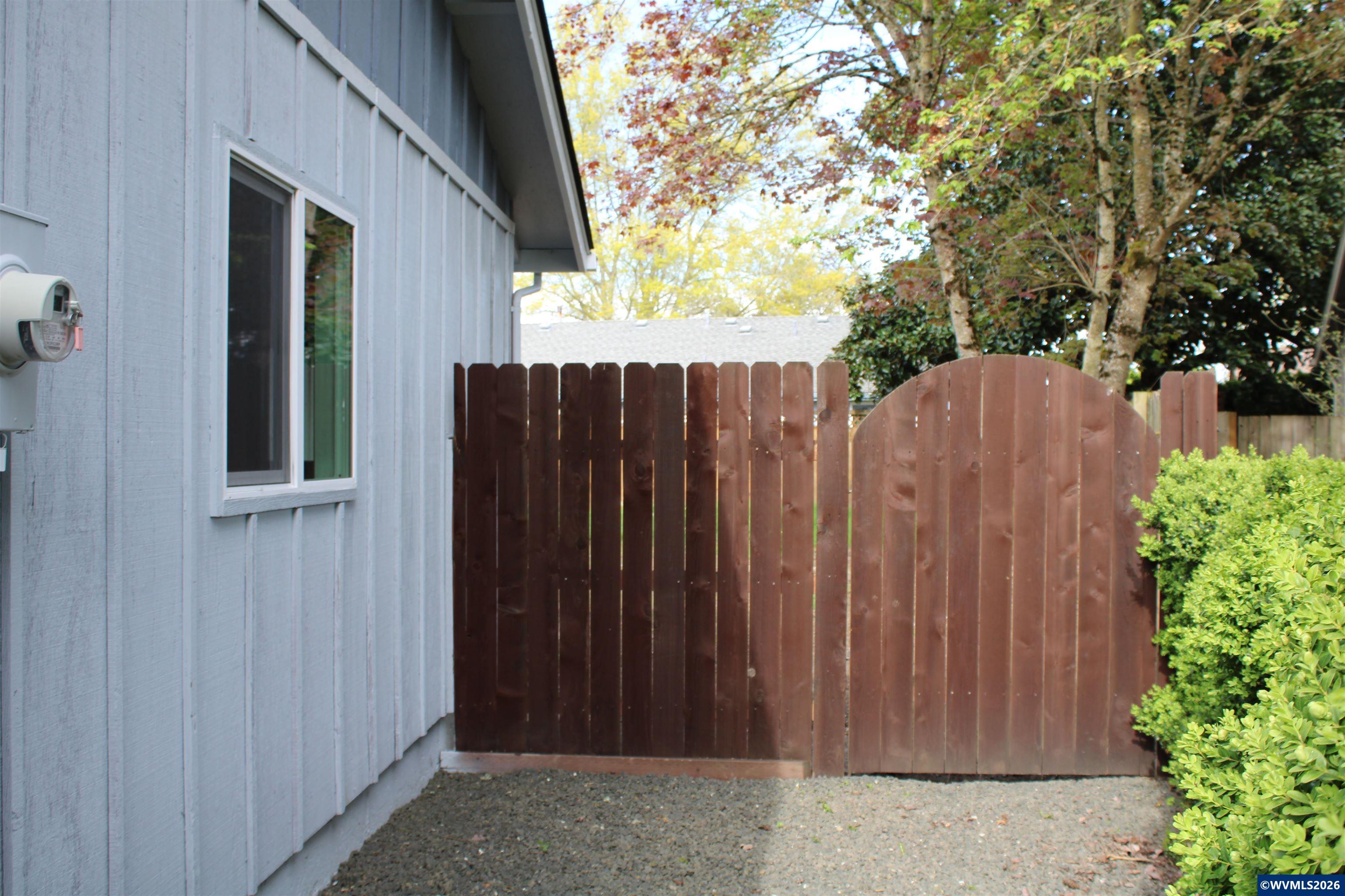 6259 Chapman Place Southwest Albany, OR 97321 - Photo 20 of 21 a view of outdoor space with wooden fence