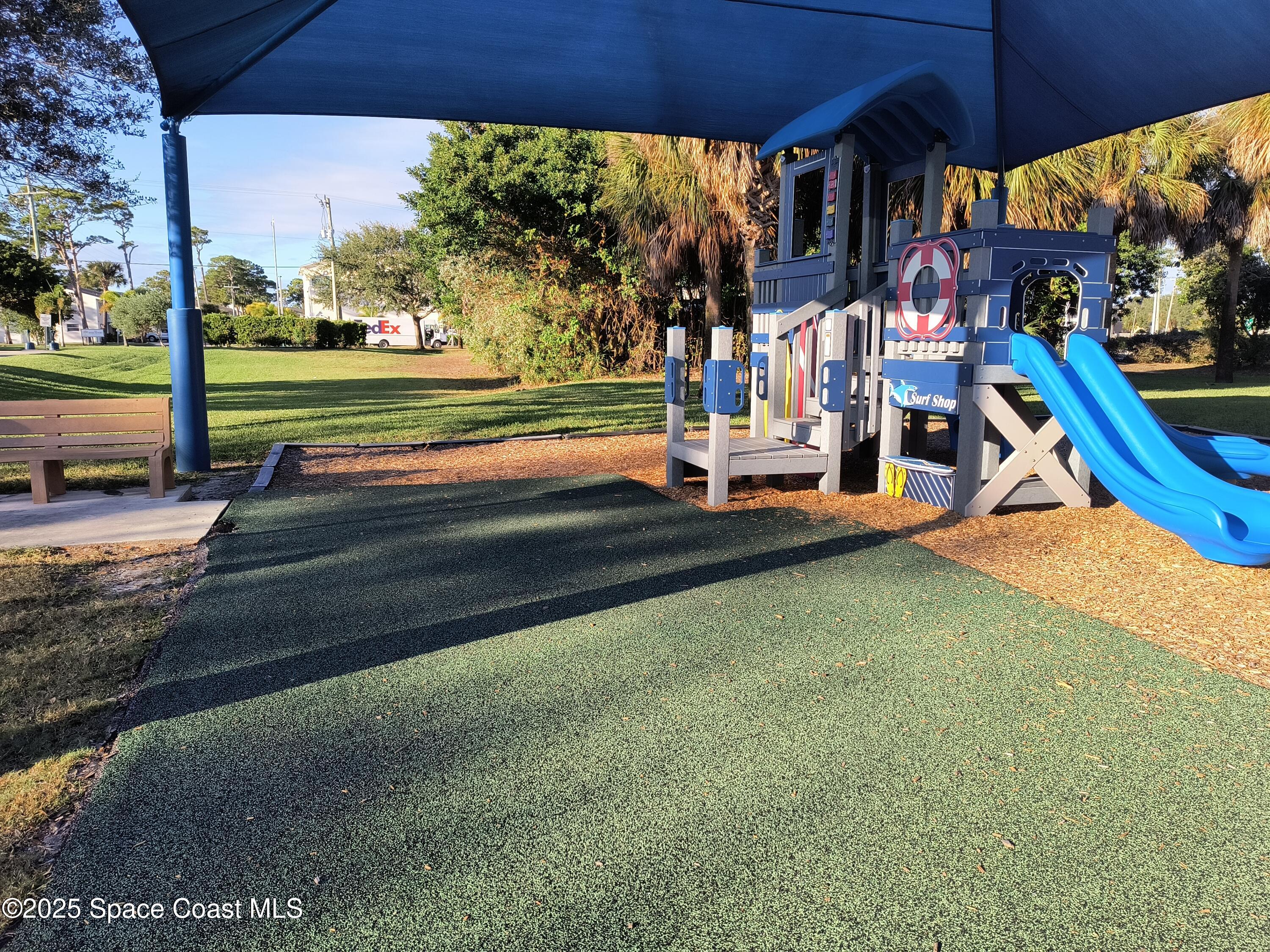 4 Colonial Way Indian Harbour Beach, FL 32937 - Photo 53 of 58 a view of a park with slide