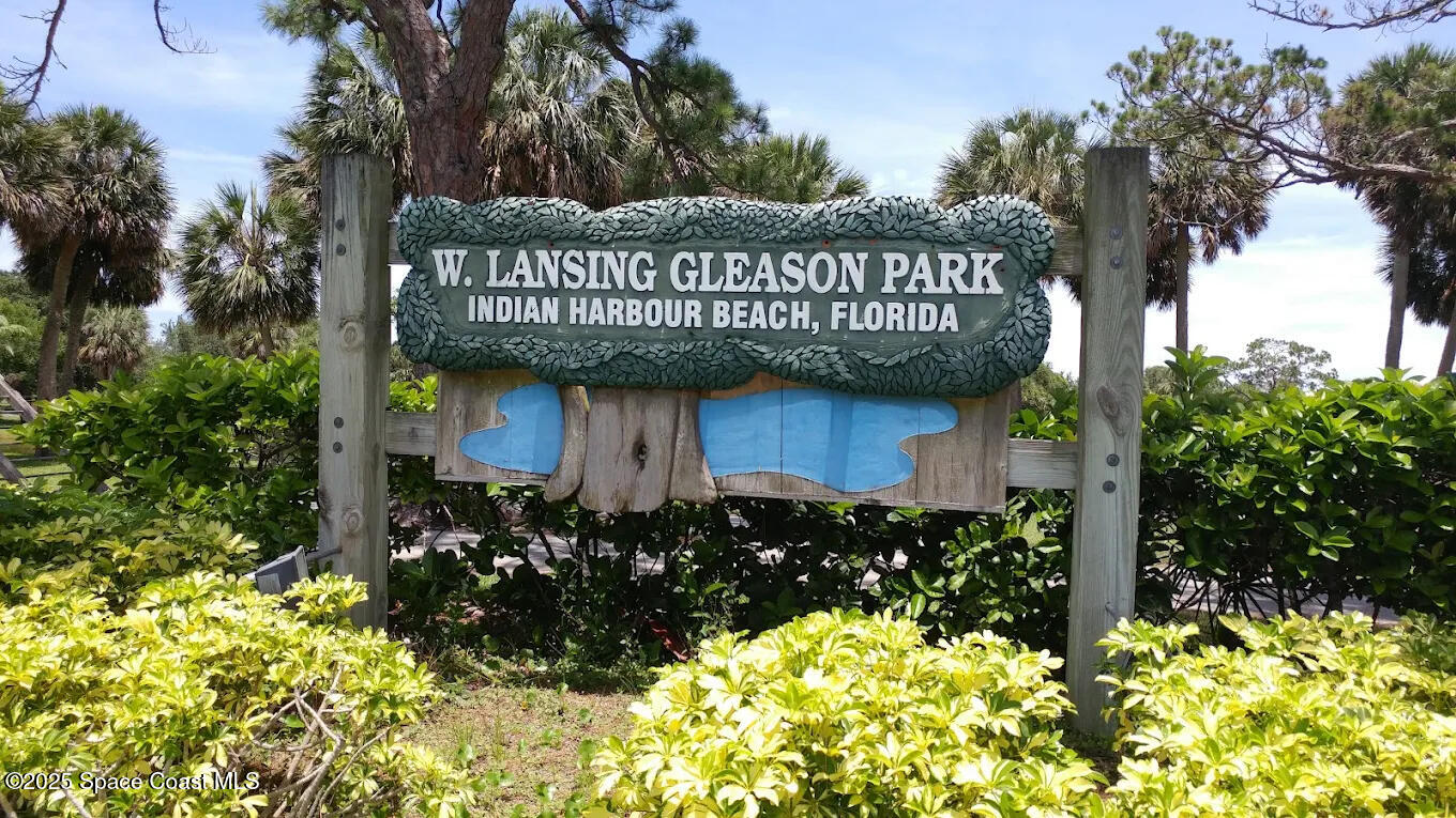 4 Colonial Way Indian Harbour Beach, FL 32937 - Photo 55 of 58 a view of a house with a wooden fence