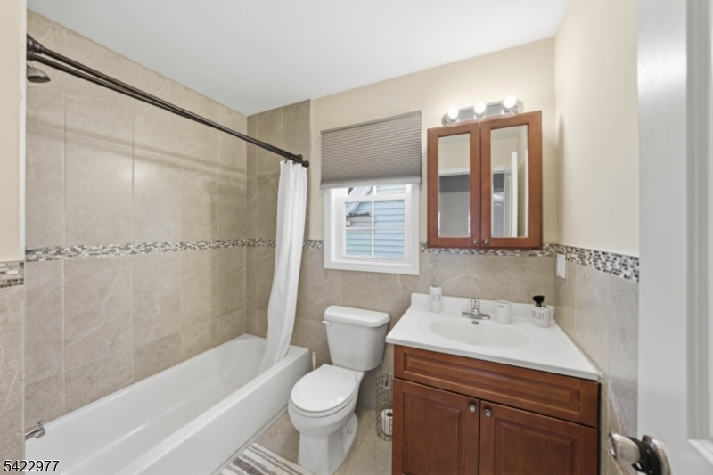 175 North 7th Street Newark, NJ 07107 - Photo 14 of 17 a bathroom with a sink toilet and shower