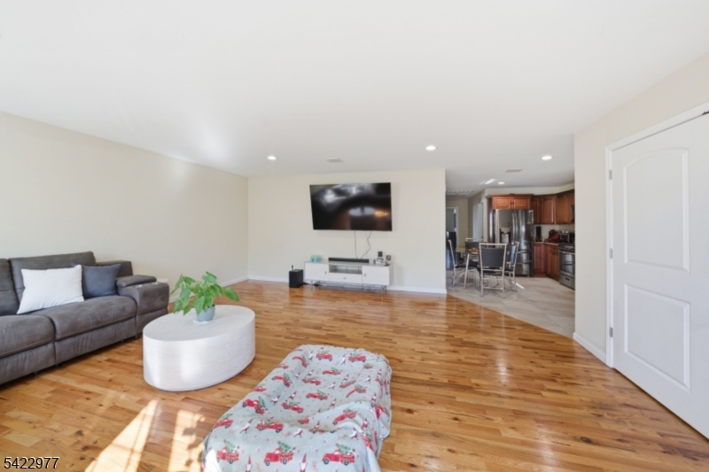 175 North 7th Street Newark, NJ 07107 - Photo 5 of 17 a living room with furniture and a flat screen tv
