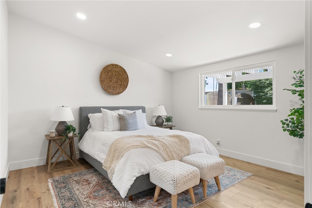 1709 Orcas Drive Costa Mesa, CA 92626 - Photo 15 of 25 a bedroom with bed and a window