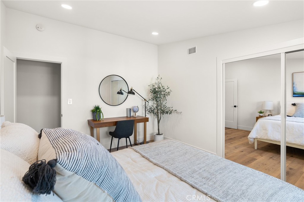 1709 Orcas Drive Costa Mesa, CA 92626 - Photo 20 of 25 a living room with furniture a rug and a lamp