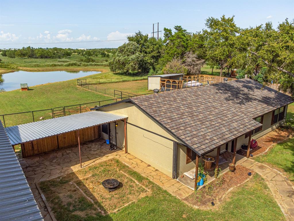 1223 Yowell Road Whitesboro, TX 76273 - Photo 1 of 1 an aerial view of a house with a patio