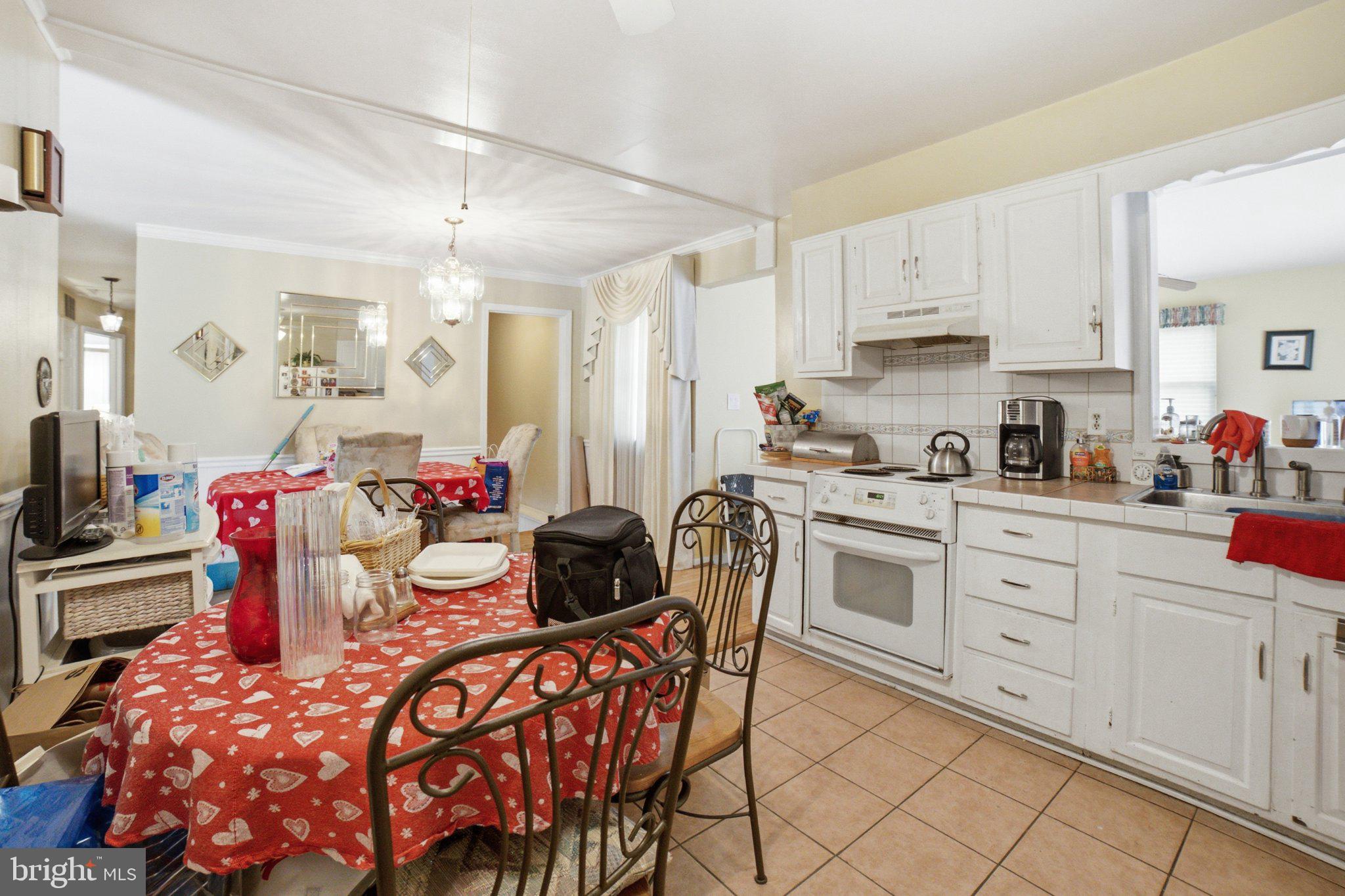 907 Logwood Road Capitol Heights, MD 20743 - Photo 5 of 16 Cozy kitchen with inviting charm.