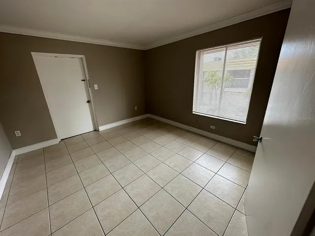 a view of an empty room and window