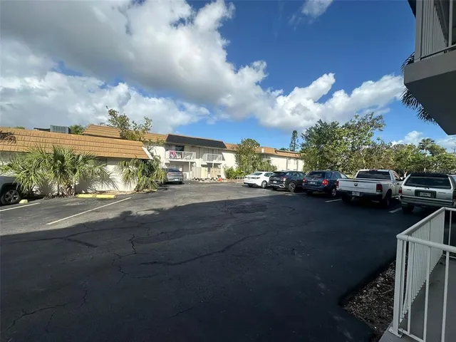 a view of a street with cars
