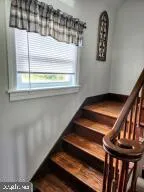 a kitchen with a sink and a refrigerator
