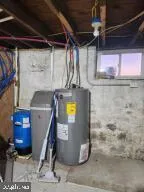 a view of a garden with sitting area