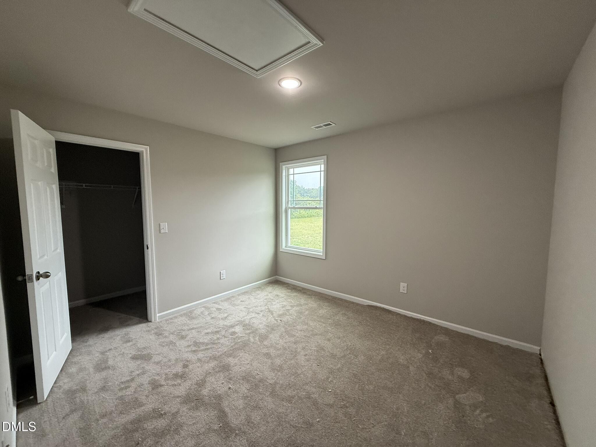 1843 Old Kenly Road Kenly, NC 27542 - Photo 13 of 16 an empty room with windows