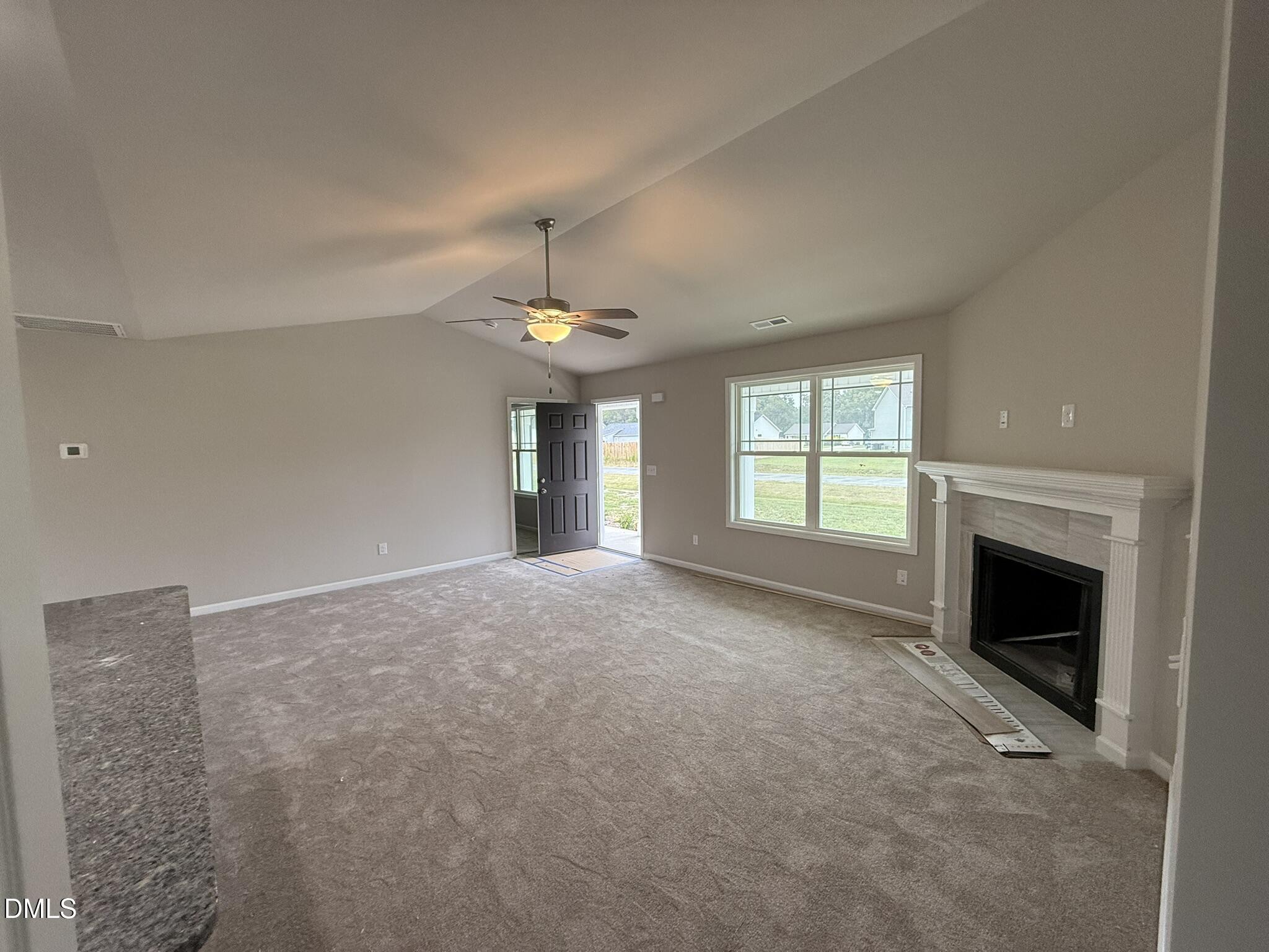 1843 Old Kenly Road Kenly, NC 27542 - Photo 4 of 16 a view of empty room with a fireplace