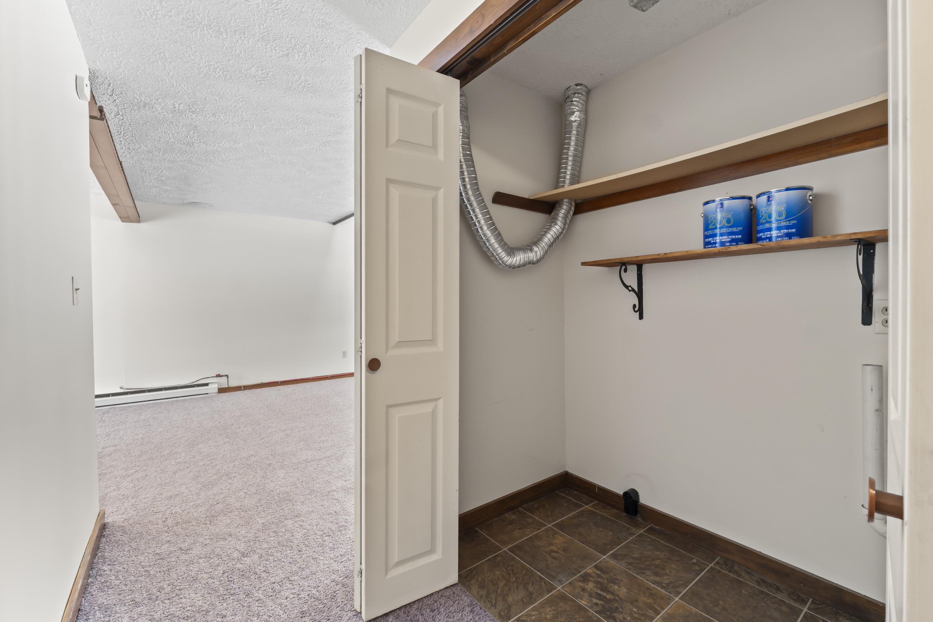 61 Ward Circle, Unit 61 Brunswick, ME 04011 - Photo 22 of 55 Downstairs hallway utility closet