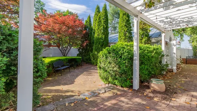 a kitchen with a sink cabinets and window
