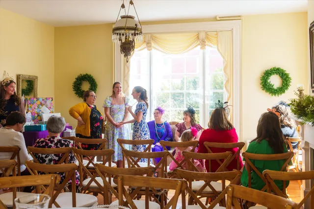 view of a dining room with furniture and a floor to ceiling window