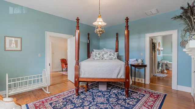 a view of an entryway with wooden floor